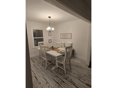 Kitchen has been remodeled, with new, cabinets, flooring and - photo 23