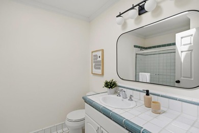 Situated on a picturesque tree-lined street and located down a - photo 24
