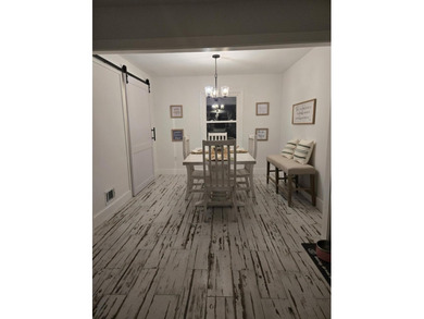 Kitchen has been remodeled, with new, cabinets, flooring and - photo 25