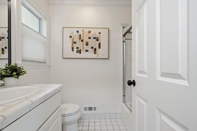 Situated on a picturesque tree-lined street and located down a - photo 28