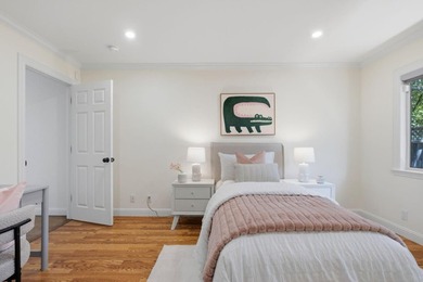 Situated on a picturesque tree-lined street and located down a - photo 29