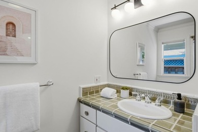 Situated on a picturesque tree-lined street and located down a - photo 31