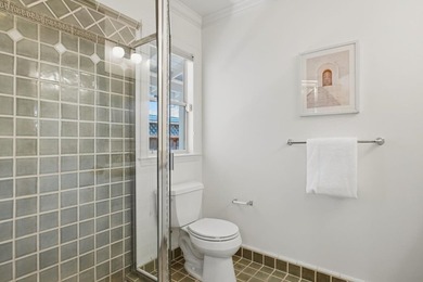 Situated on a picturesque tree-lined street and located down a - photo 32
