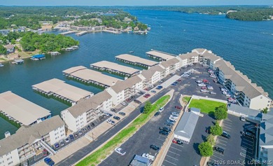 This beautifully updated condo sits high above the lake with - photo 33