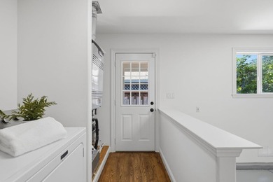 Situated on a picturesque tree-lined street and located down a - photo 35