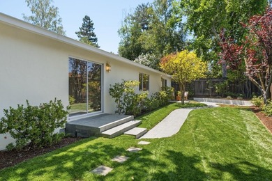 Situated on a picturesque tree-lined street and located down a - photo 36