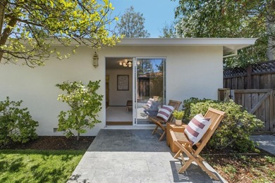 Situated on a picturesque tree-lined street and located down a - photo 37