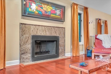 This inviting 5-bedroom, 3-bath all-brick home sits on just - photo 8