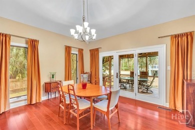 This inviting 5-bedroom, 3-bath all-brick home sits on just - photo 9