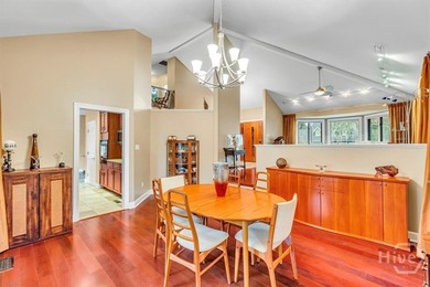 This inviting 5-bedroom, 3-bath all-brick home sits on just - photo 10