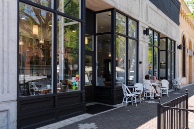Situated on a picturesque tree-lined street and located down a - photo 46
