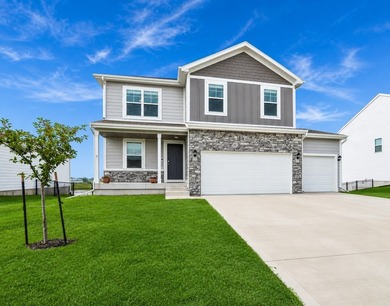 Welcome to this Stylish Two-Story home in Waukee with 4 bedrooms - photo 1