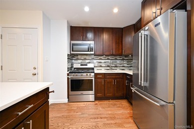 Beautifully maintained brick 2-family in prime Flushing location - photo 12