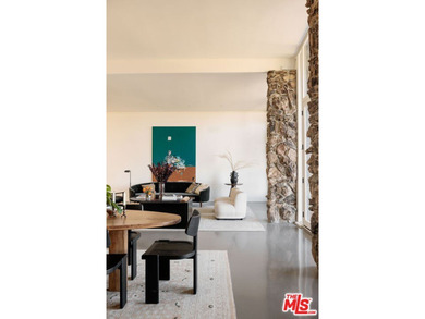 Tucked in an exclusive pocket of the Hollywood Hills, this - photo 12