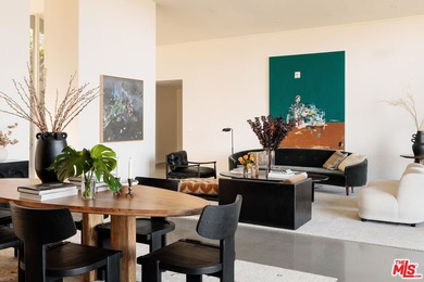 Tucked in an exclusive pocket of the Hollywood Hills, this - photo 15