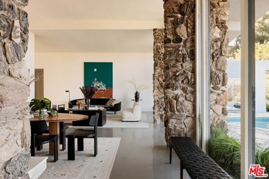 Tucked in an exclusive pocket of the Hollywood Hills, this - photo 16