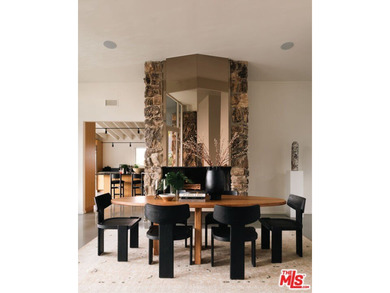 Tucked in an exclusive pocket of the Hollywood Hills, this - photo 17