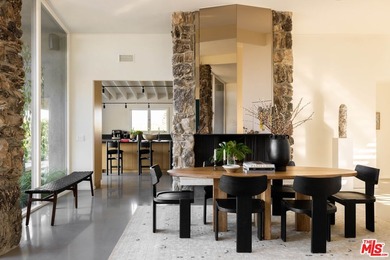 Tucked in an exclusive pocket of the Hollywood Hills, this - photo 18