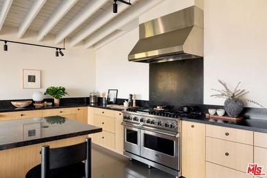 Tucked in an exclusive pocket of the Hollywood Hills, this - photo 20