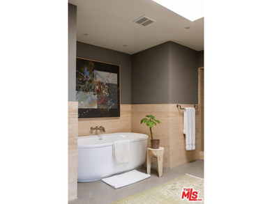 Tucked in an exclusive pocket of the Hollywood Hills, this - photo 31