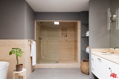 Tucked in an exclusive pocket of the Hollywood Hills, this - photo 32