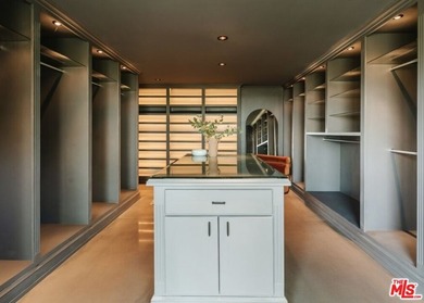 Tucked in an exclusive pocket of the Hollywood Hills, this - photo 33