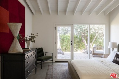 Tucked in an exclusive pocket of the Hollywood Hills, this - photo 34