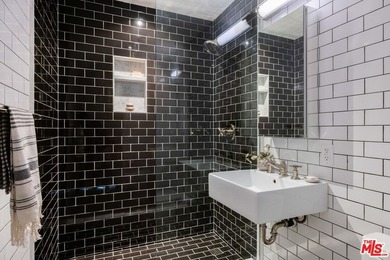 Tucked in an exclusive pocket of the Hollywood Hills, this - photo 37