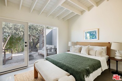 Tucked in an exclusive pocket of the Hollywood Hills, this - photo 38