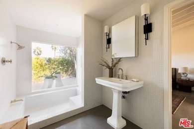 Tucked in an exclusive pocket of the Hollywood Hills, this - photo 39