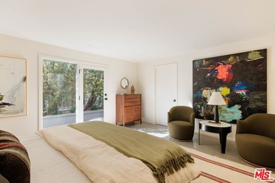Tucked in an exclusive pocket of the Hollywood Hills, this - photo 40