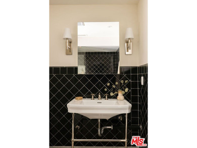 Tucked in an exclusive pocket of the Hollywood Hills, this - photo 41