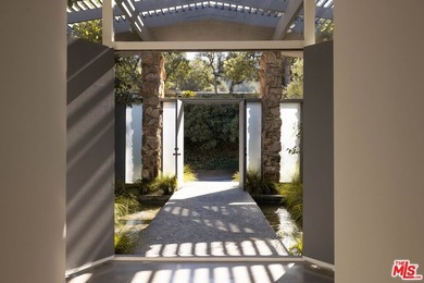 Tucked in an exclusive pocket of the Hollywood Hills, this - photo 43
