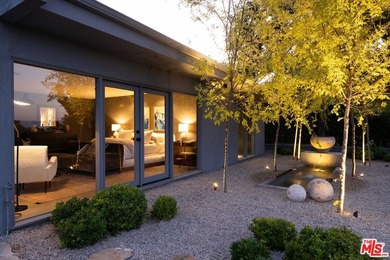 Tucked in an exclusive pocket of the Hollywood Hills, this - photo 44