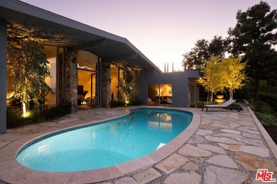 Tucked in an exclusive pocket of the Hollywood Hills, this - photo 45