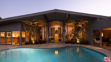 Tucked in an exclusive pocket of the Hollywood Hills, this - photo 46