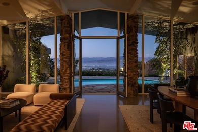 Tucked in an exclusive pocket of the Hollywood Hills, this - photo 47