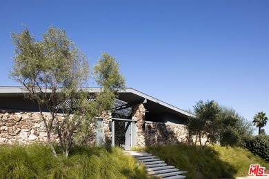 Tucked in an exclusive pocket of the Hollywood Hills, this - photo 48