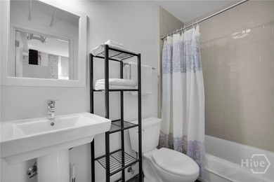 Experience sleek, stylish downtown living at 310 W Broughton - photo 7