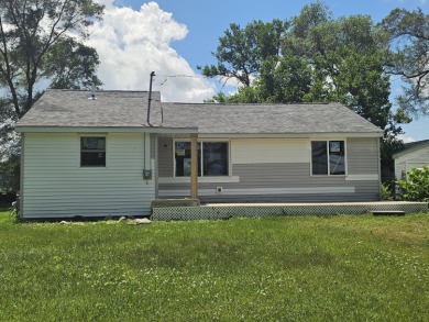 Lake Home Sale Pending in Colon, Michigan