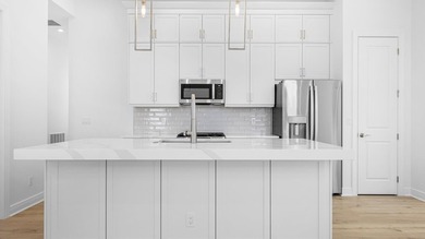 Move in Ready-New Construction by Kolter Homes. This 2-bedroom - photo 2