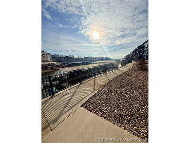 Step into easy lake living with a completely turn-key 2 bed, 2