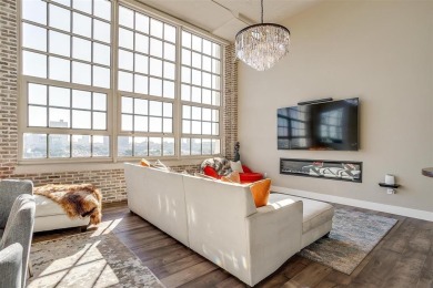 Experience luxury in this premier, downtown-facing condo at the