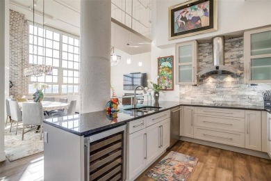 Experience luxury in this premier, downtown-facing condo at the