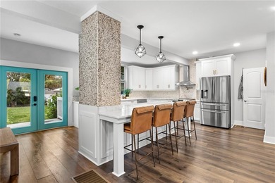 Welcome home to 623 1st Ave N in Safety Harbor FL that is set on - photo 3