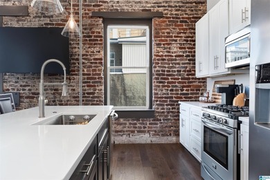 We believe this is the best condo in historic Founders Station! - photo 4
