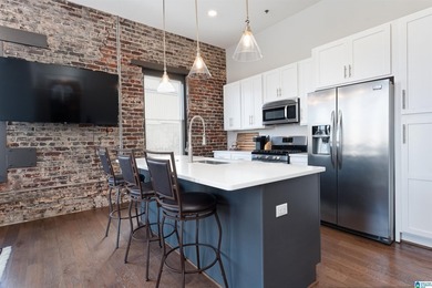 We believe this is the best condo in historic Founders Station! - photo 5