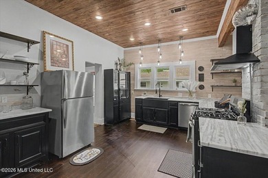 This beautifully renovated home combines modern luxury with - photo 6