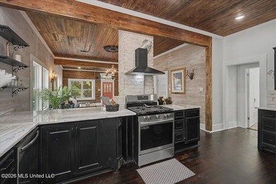 This beautifully renovated home combines modern luxury with - photo 7