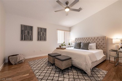 Beautiful single-story end-unit townhome located in a gated